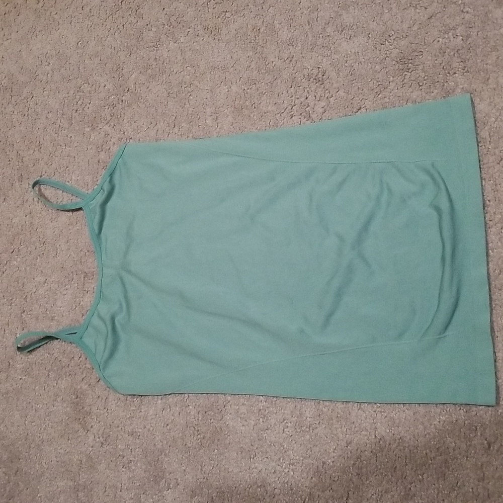 Small teal tank top.